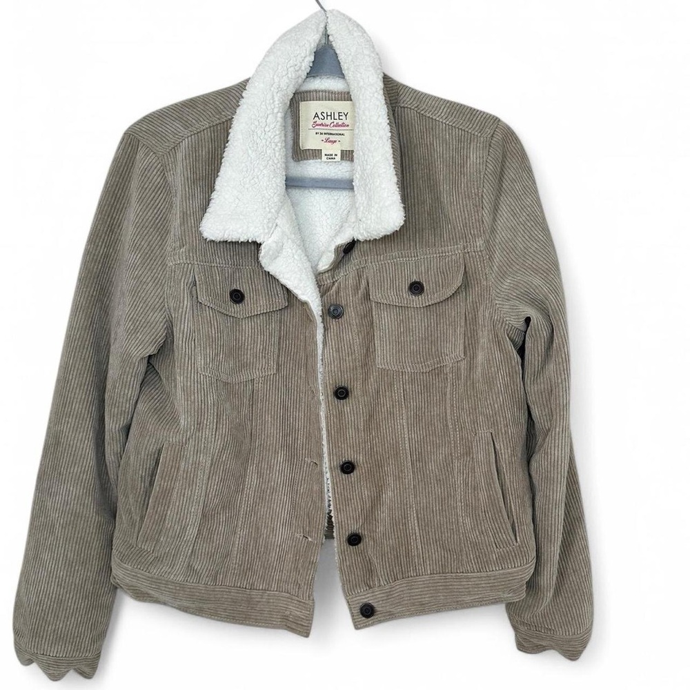 Tan and white corduroy jacket with white fur lining